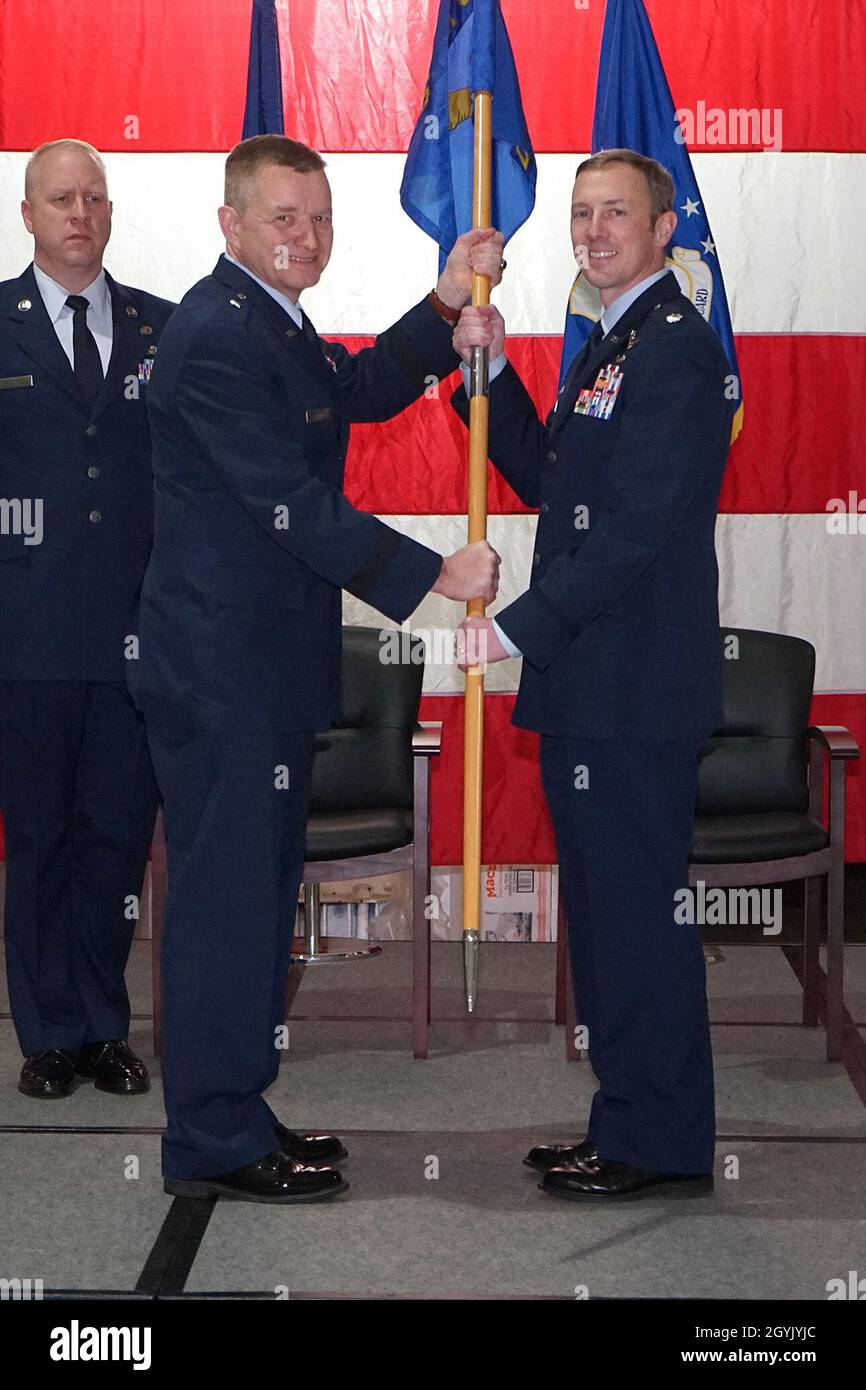 Lt. Col. Matthew Robins accepts the position of 127th Operations Group commander from the 127th Wing Commander Brig. Gen. Rolf E. Mammen at Selfridge Air National Guard Base, Mich., Jan. 11, 2020. The 127th Operations Group is comprised of the 107th Fighter Squadron and the 127th Operations Support Squadron which operate and provide support of the A-10 Thunderbolt II. (U.S. Air National Guard photo by Senior Airman Ryan Zeski) Stock Photo