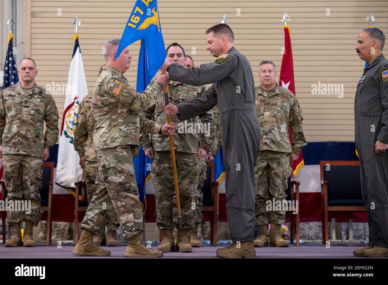 West Virginia National Guard Adjutant General, Maj. Gen. James Hoyer and Col. Martin Timko ceremoniously exchange the 167th Airlift Wing guidon during a change of command ceremony, Jan. 12, 2020. Timko assumed command of the wing, Col. David Cochran relinquished command during the ceremony. (U.S. Air National Guard photo by Senior Master Sgt. Emily Beightol-Deyerle) Stock Photo