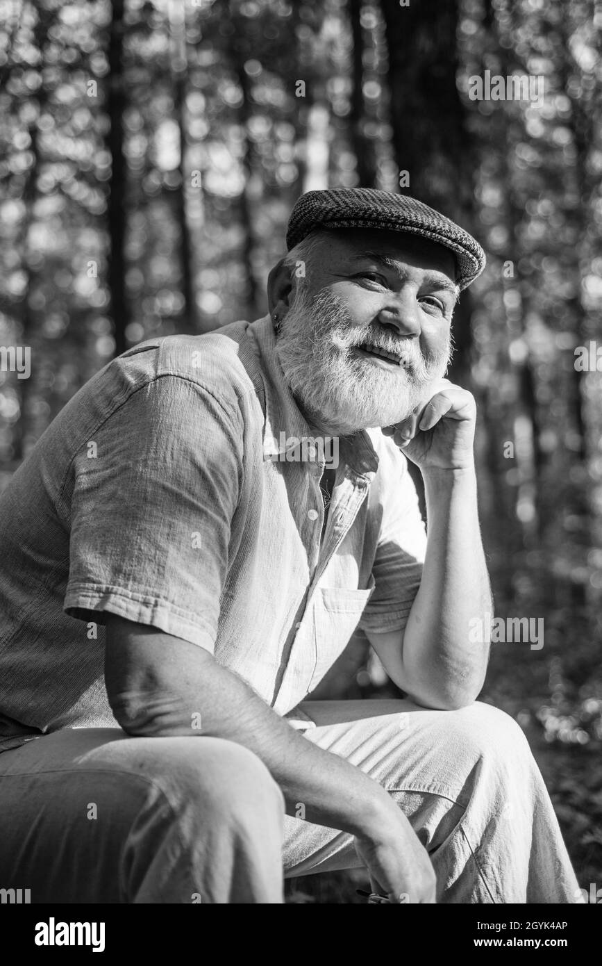 His new life as pensioner. Old pensioner relax in natue. Pensioner with