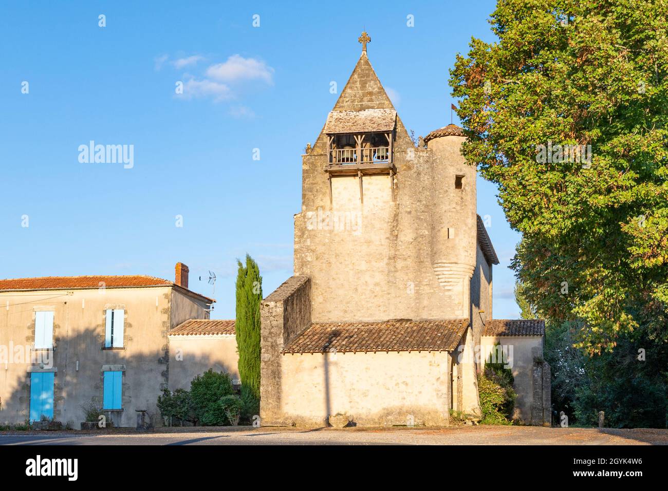 The village church Église Saint-Pierre de Gans was once a feudal chapel and part of the castle at Gans near Bazas, Nouvelle-Aquitaine, France, Stock Photo