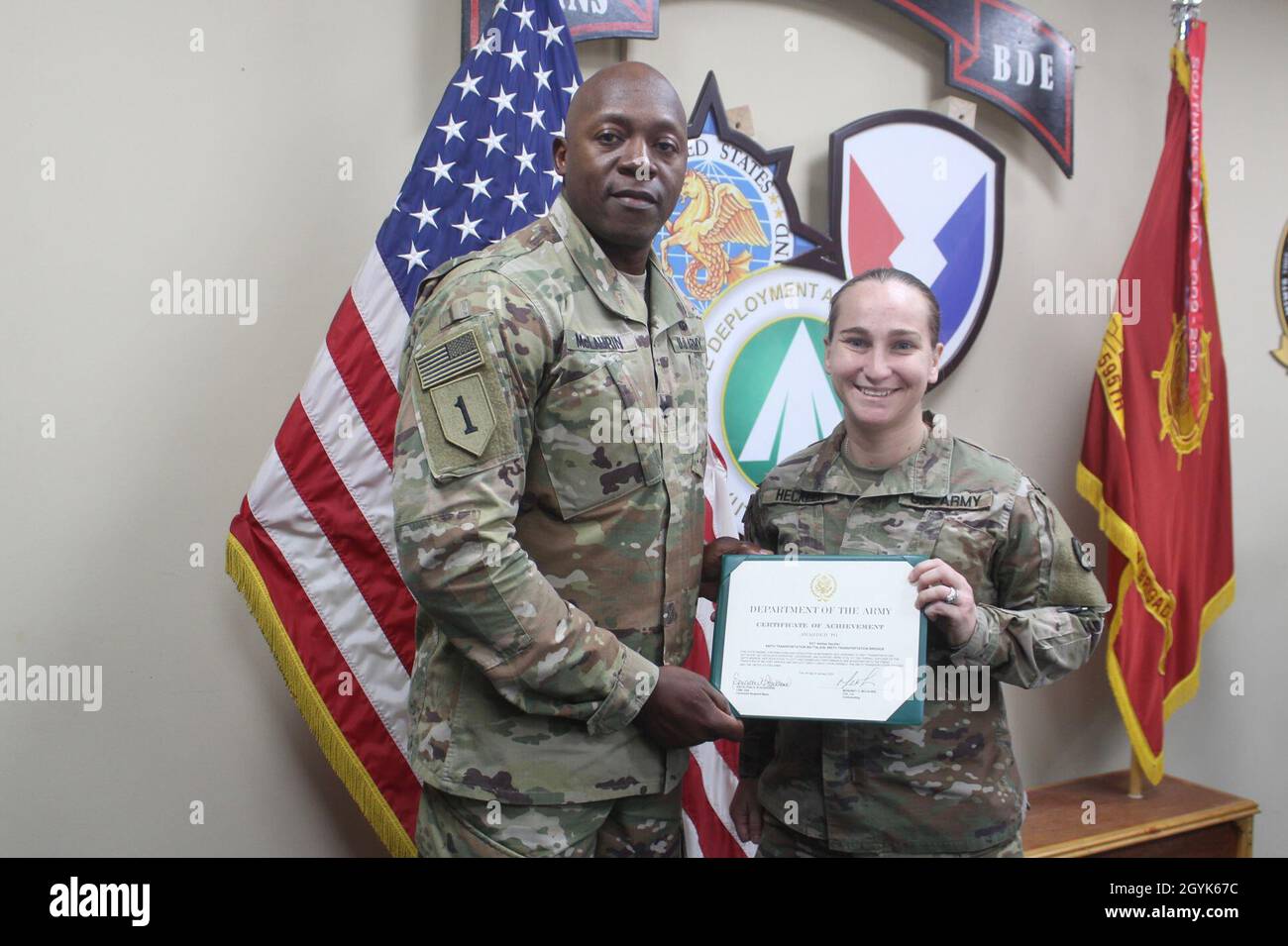Sgt. Ahslee S. Heckler, 840th Transportation Battalion, was recognized as the Desert Knight of the month by Col. Mondrey O. McLaurin, commander, 595th Transportation Brigade, during a ceremony where she received the Army Certificate of Achievement at Camp Arifjan, Kuwait, Jan. 14, 2020. (U.S. Army photo by Claudia LaMantia) Stock Photo