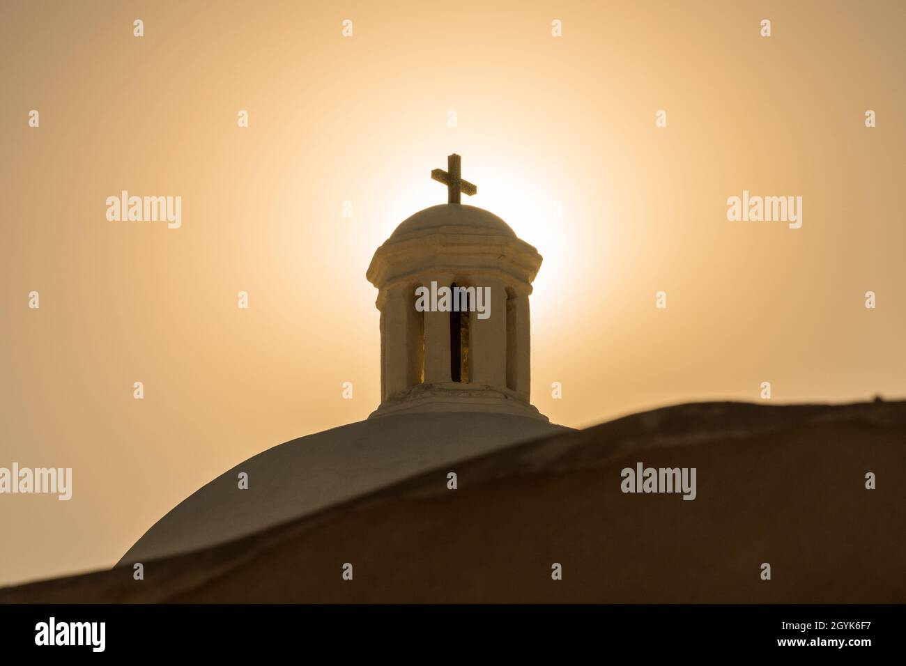 The cross on the dome of the church of the Mission of San Jose de Tumacacori.  Tumacacori National Historical Park Stock Photo