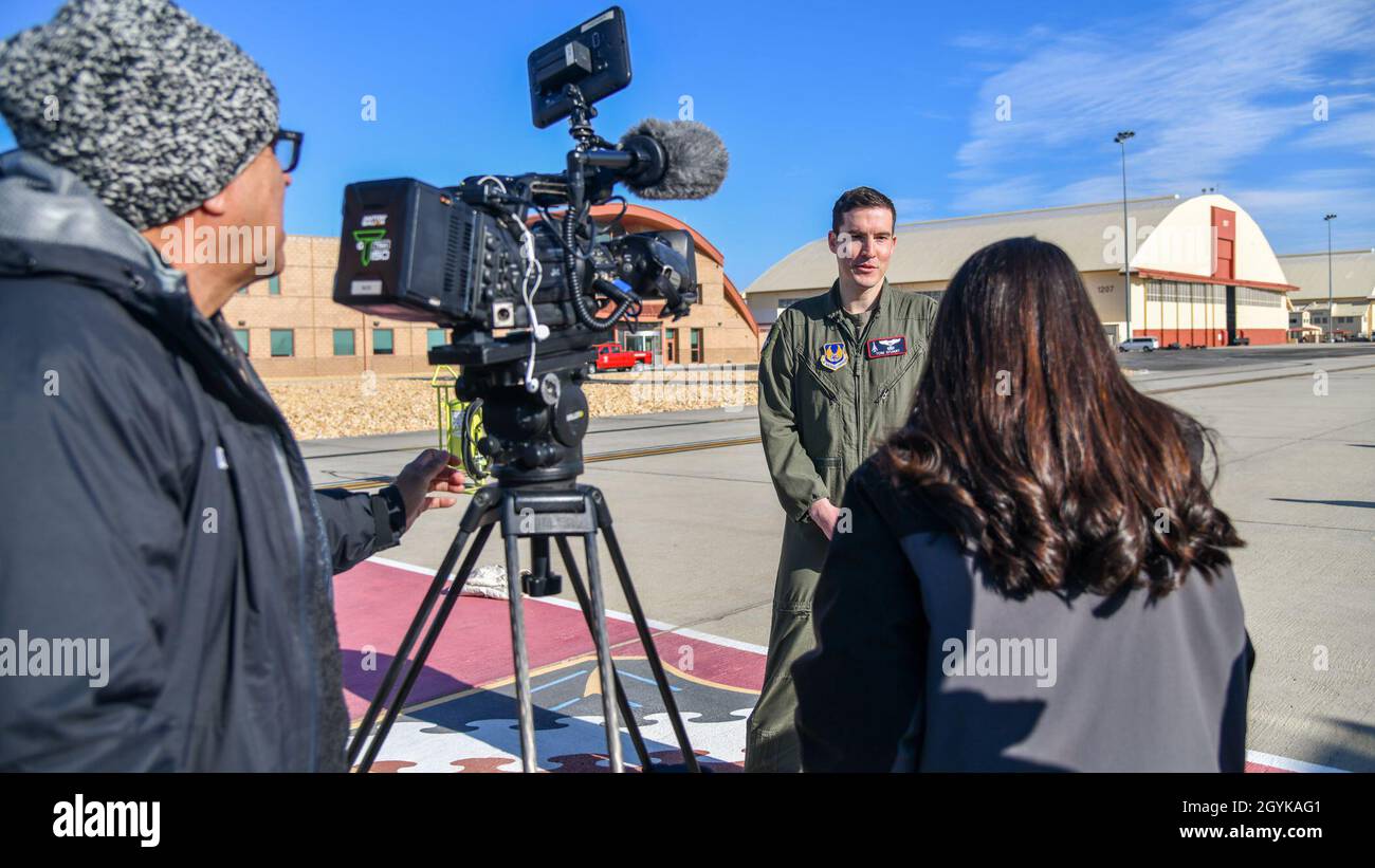 Maj. Thomas Stuart, 412th Test Wing and Aerospace Valley Air Show Director, talks to local news media reporters at Edwards Air Force Base, California, Jan. 16. Air show officials hosted a Thunderbirds Flight Demonstration Squadron advance pilot to conduct a site survey prior to their performance at the air show Oct. 10-11. (Air Force photo by Giancarlo Casem) Stock Photo