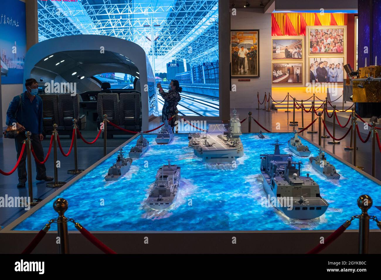 Models of PLA's Shandong aircraft carrier group and High-speed rail at the Museum of the Communist Party of China in Beijing. 08-Oct-2021 Stock Photo
