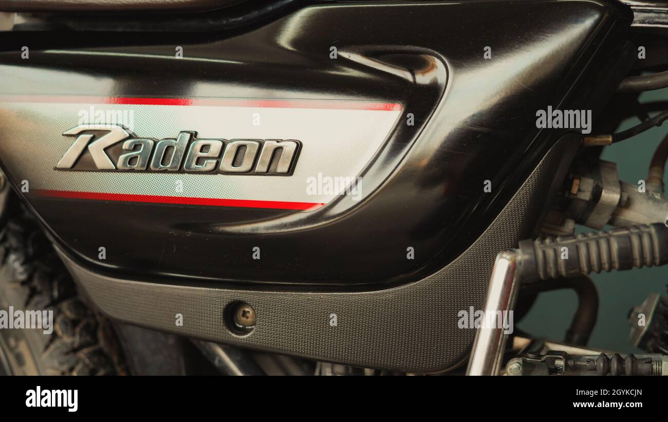 05 October 2021 Reengus, Rajasthan, India. Photo of a TVS motorcycle Radeon side panel with its model name. Stock Photo