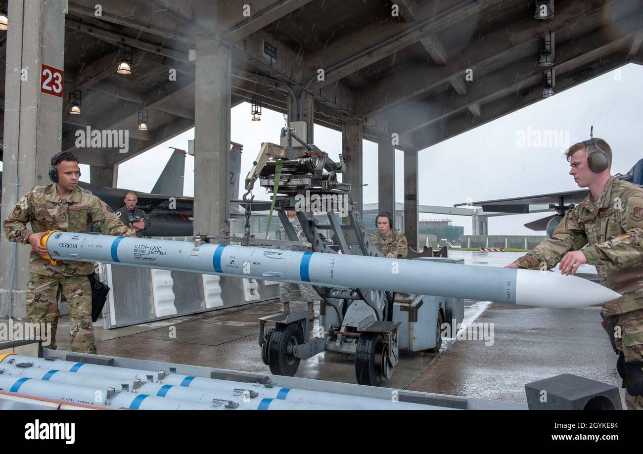 U.S. Air Force load crew members from the 44th Aircraft Maintenance ...