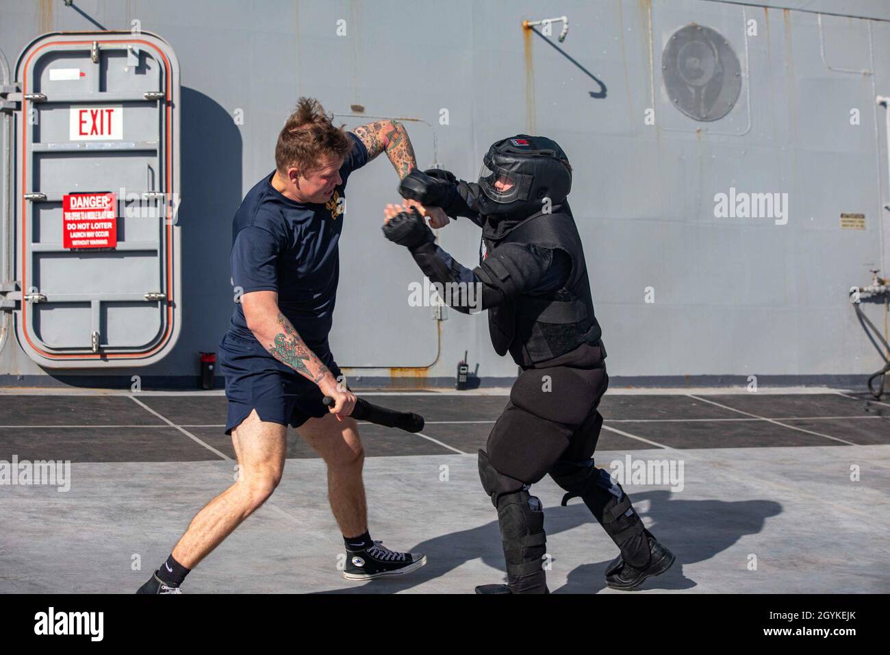 200117-N-GR168-2214 AQABA, Jordan (Jan. 17, 2020) Fire Controlman 3rd Class Daniel Grubbs blocks a strike from Fire Controlman 1st Class Brian Boyer, both assigned to the amphibious transport dock ship USS New York (LPD 21), during a Security Reaction Force Basic (SRF-B) course aboard the New York, Jan. 17, 2020. New York, with the Bataan Amphibious Ready Group and with embarked 26th Marine Expeditionary Unit, is conducting bilateral training in partnership with the Royal Jordanian Marines and Navy in support of maritime security operations to reassure allies and partners and preserve freedom Stock Photo