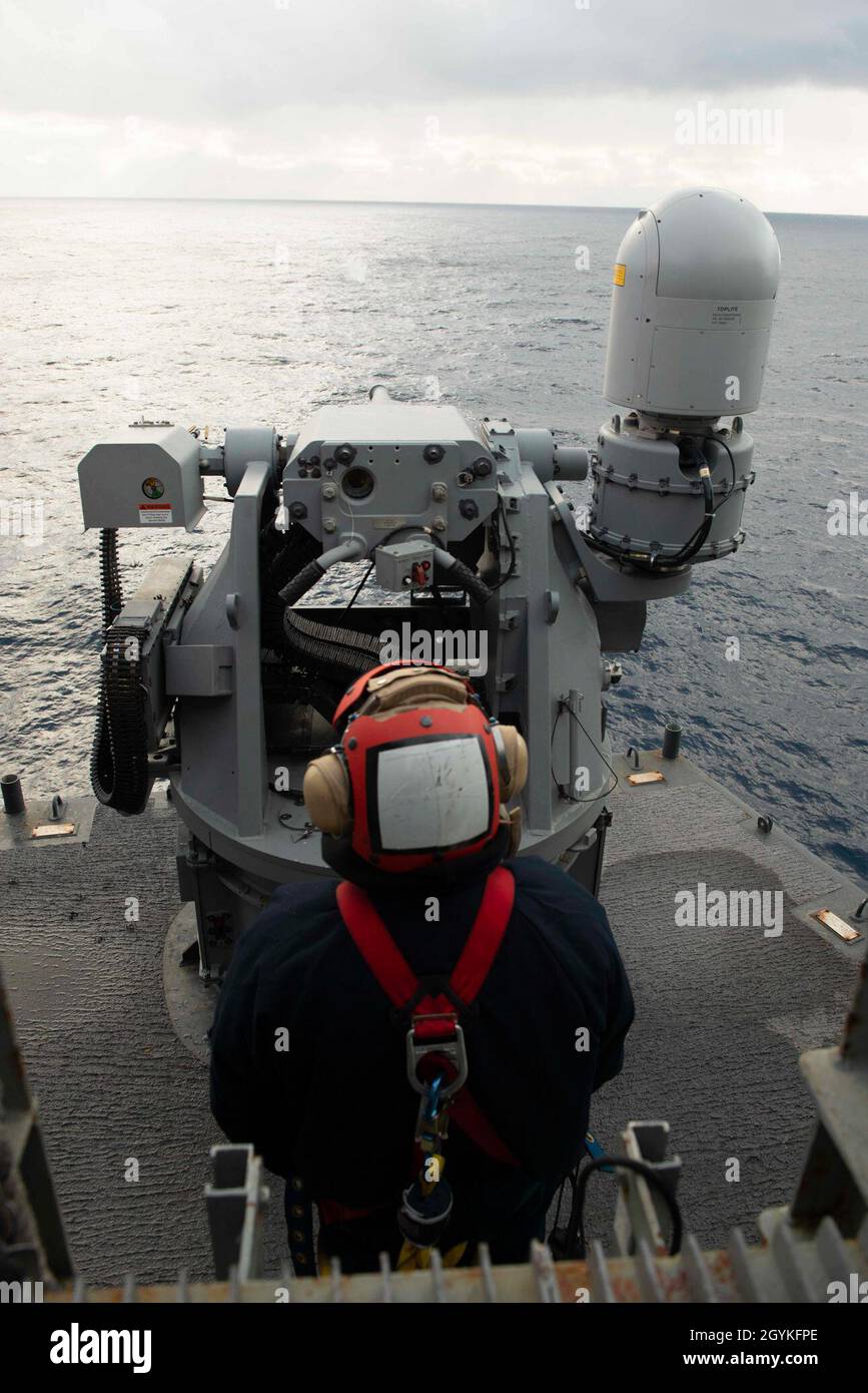 200118-N-DM241-1065  ATLANTIC OCEAN (Jan. 18, 2020) Gunner’s Mate 3rd Class Isaac Estonilo, from Oakland, California, mans an MK-38 machine gun during a live-fire exercise aboard the aircraft carrier USS Dwight D. Eisenhower (CVN 69). Ike is conducting operations in the Atlantic Ocean as part of the USS Dwight D. Eisenhower Carrier Strike Group. (U.S. Navy photo by Mass Communication Specialist 2nd Class Elizabeth Cohen/Released) Stock Photo