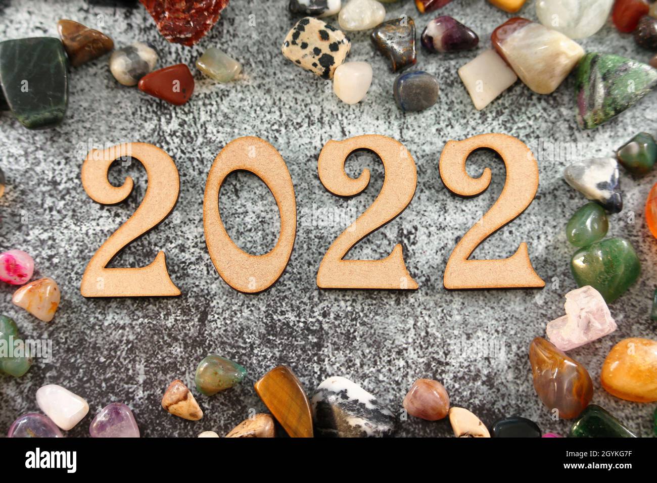 Happy New Year. The number 2022 on black background. Stock Photo