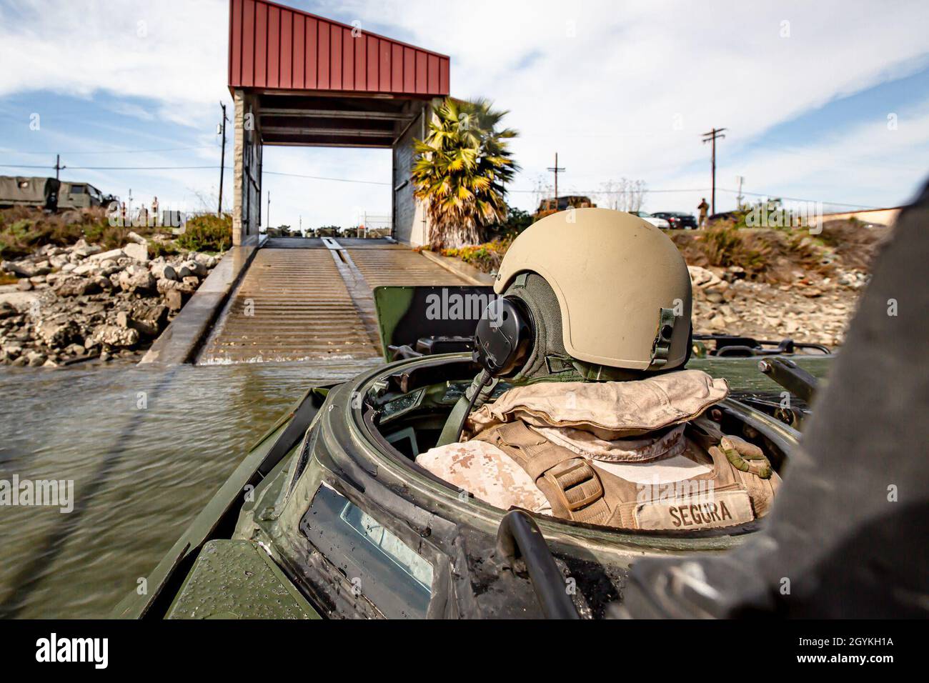 U.S. Marine Corps Sgt. Salomon Segura, an assault amphibious vehicle section leader with 3rd Assault Amphibian Battalion, drives an AAV-P7/A1 assault amphibious vehicle out of the water during Exercise Iron Fist 2020 on Marine Corps Base Camp Pendleton, California, Jan. 19. Exercise Iron Fist provides realistic, relevant training necessary for effective combined military operations. (U.S. Marine Corps photo by Lance Cpl. Britany Rowlett) Stock Photo