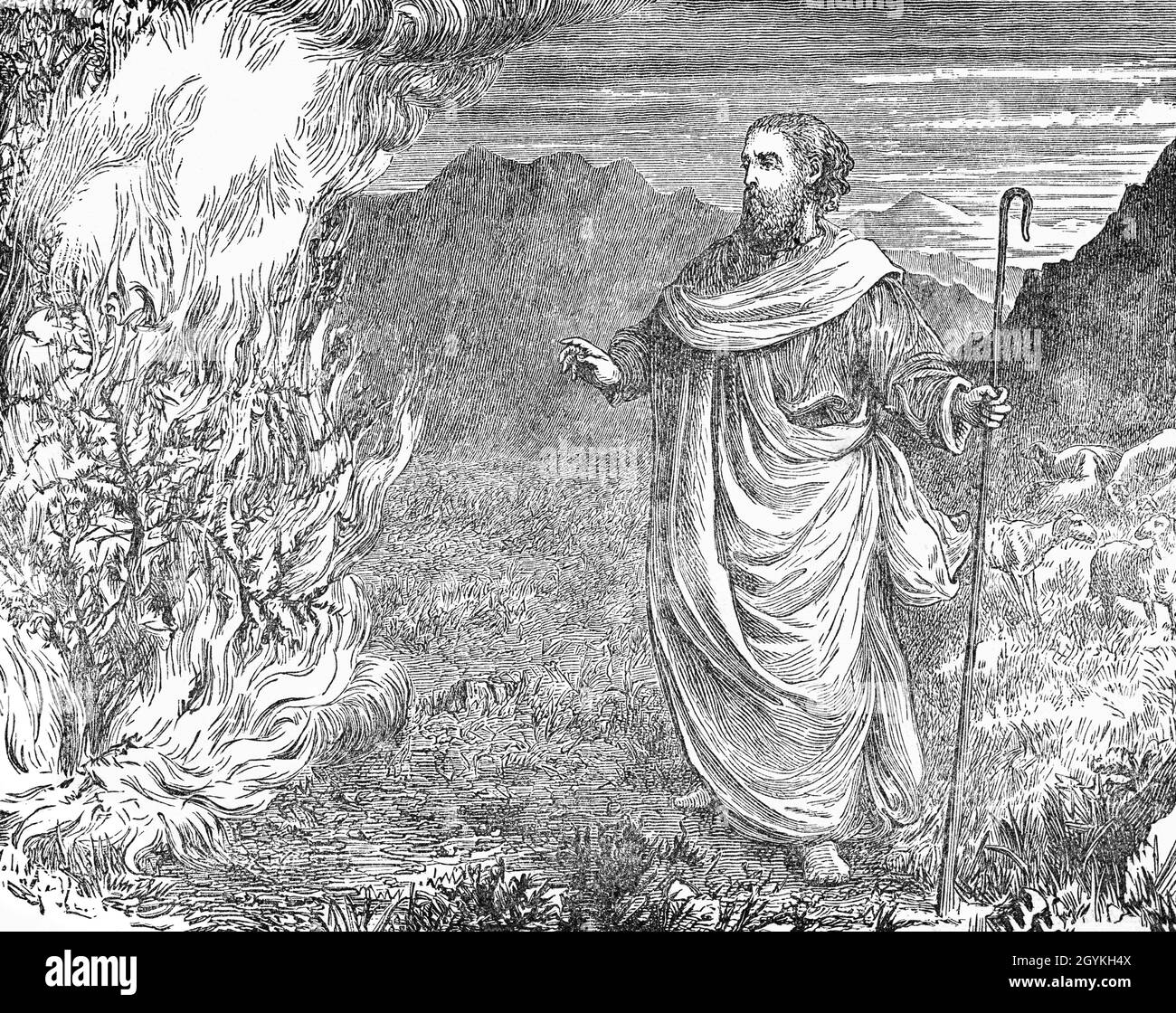 A late 19th Century illustration from the Book of Genesis of the story of Moses who, when shepherding his father-in-law Jethro's sheep in the land of Midian, is witness to a burning bush on Mount Horeb.  When Moses approaches the bush, the voice of God calls out to him to remove his sandals in the presence of the holy ground.  God explains to Moses he has a plan for him to save the Israelites from slavery in Egypt and lead them to the Promised Land of Canaan. Stock Photo