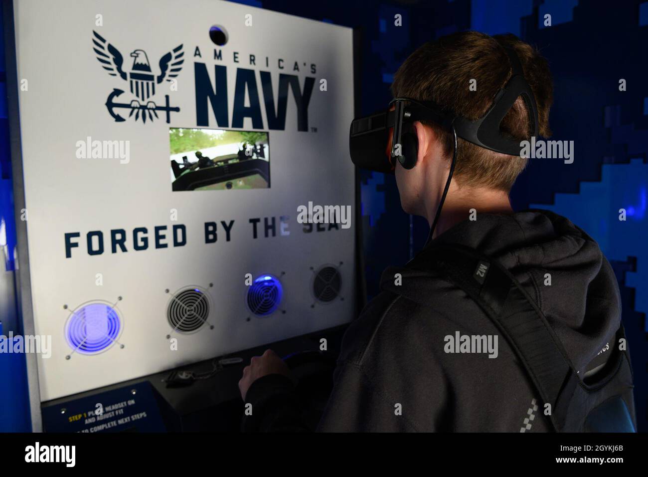 200120-N-FS414-2337 LOS ANGELES (Jan 20, 2020) – A Six Flags Magic Mountain, Los Angeles, California park guest experiences a special warfare mission in the “Burke” virtual reality exhibit during the Los Angeles Swarm. A Swarm event is a large-scale recruiting effort run by the nation’s top Navy recruiters to saturate a specified market with Navy outreach, information and recruiting assets. (U.S. Navy photo by Mass Communication Specialist Seaman Apprentice Elijah Newton) Stock Photo