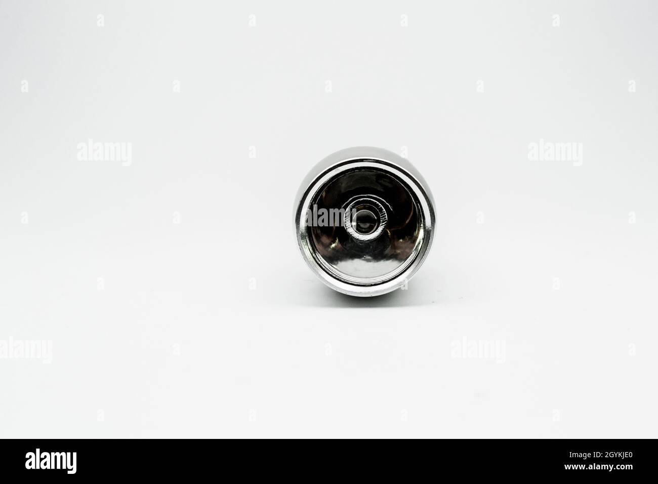 silver flashlight with isolated empty background Stock Photo