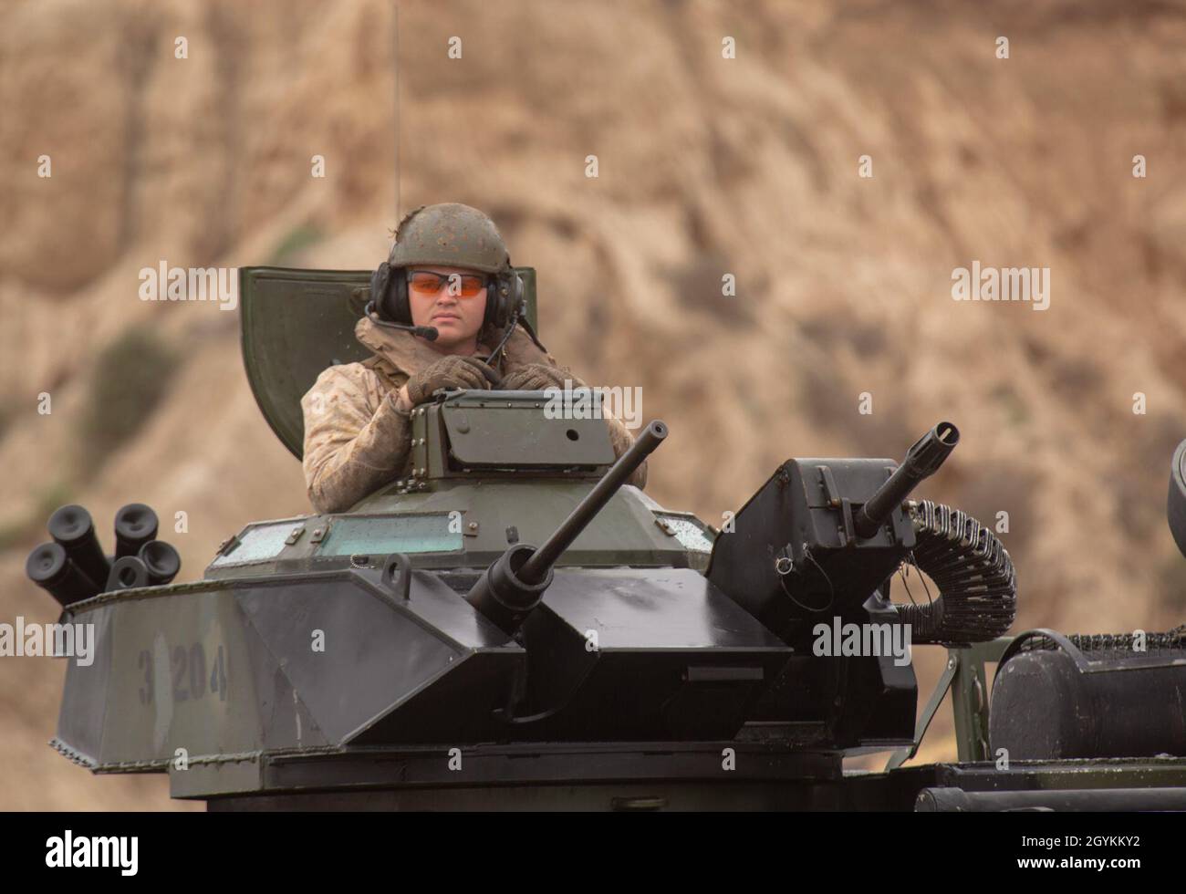 U.S. Marine Corps Cpl. Alexander Pritchard, a crew chief with 3rd Assault Amphibian Battalion, operates the turret of an AAV-P7/A1 assault amphibious vehicle as part of a section-level beach landing training during Exercise Iron Fist 2020 on Marine Corps Base Camp Pendleton, California, Jan. 20. Exercises like Iron Fist enhance the Marine Corps ability to quickly deploy sea-based assets and provide military forces anywhere in the world. (U.S. Marine Corps photo by Sgt. Desiree King) Stock Photo