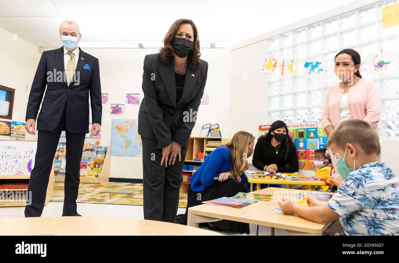 United States Vice President Kamala Harris (C) plays bingo with