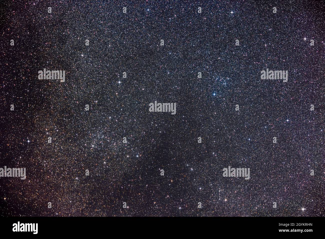 The pair of large and loose star clusters on the Serpens-Ophiuchus border known as the S-O Double Cluster. IC 4756 is at left; NGC 6633 is at right. B Stock Photo