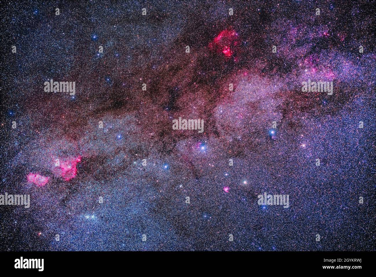 This is a wide shot encompassing the constellation of Cassiopeia the Queen in the northern autumn sky, showing the variety of colours in the starcloud Stock Photo