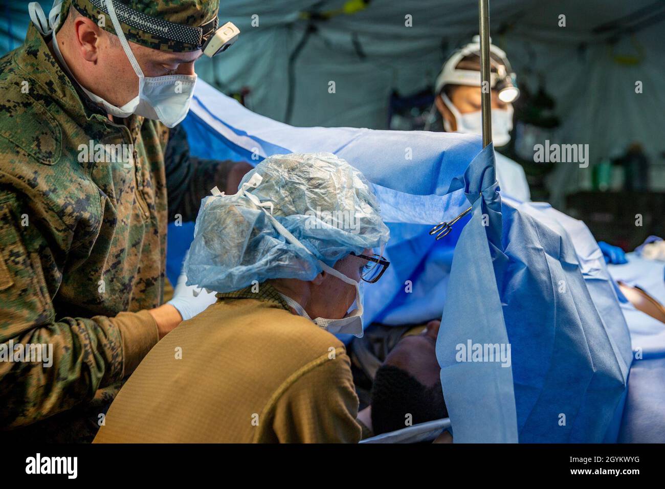 U.S. Navy Lt. Cmdr. Aaron Bernadette and Petty Officer 3rd Class Tamar Farmer prepare to intubate a simulated patient prior to surgery during exercise Northern Viper on Yausubetsu Training Area, Hokkaido, Japan, Jan. 23, 2020. Personnel currently assigned to the Logistics Combat Element for exercise Northern Viper prepare for upcoming operations. Northern Viper is a regularly scheduled training exercise that is designed to enhance the interoperability of the U.S. and Japan Alliance by allowing Marine Air-Ground Task Forces from III Marine Expeditionary Force to maintain their lethality and pro Stock Photo