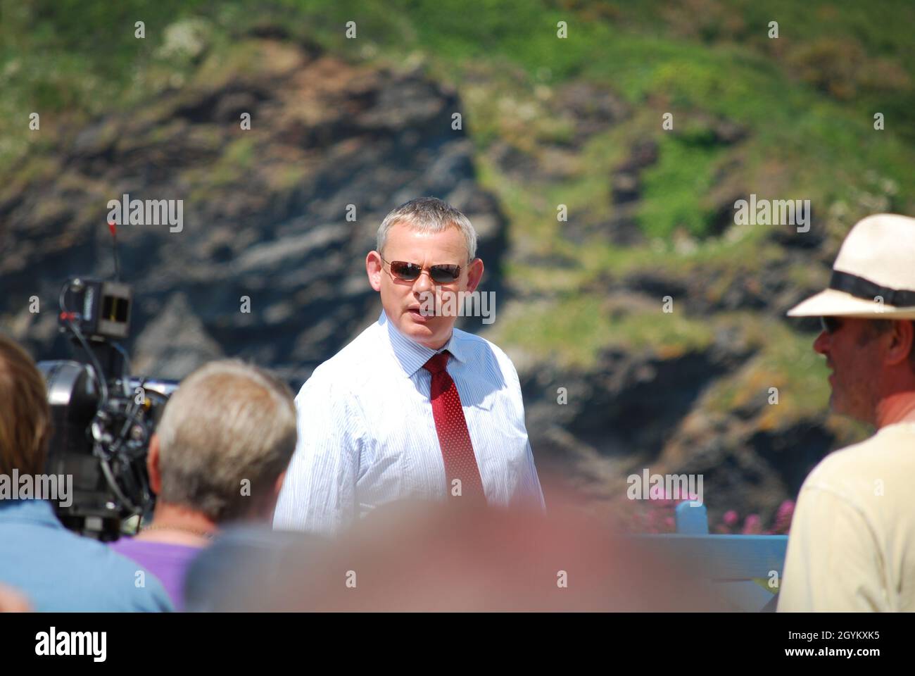 Martin Clunes on location at Port Isaac in Cornwall filming the British television series Doc Martin Stock Photo