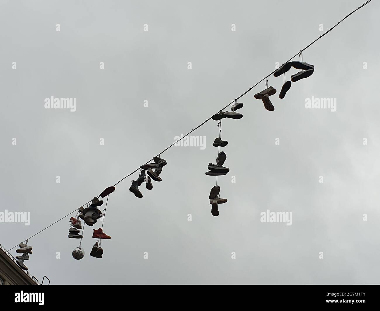 Hanging shoes in Bremen Stock Photo