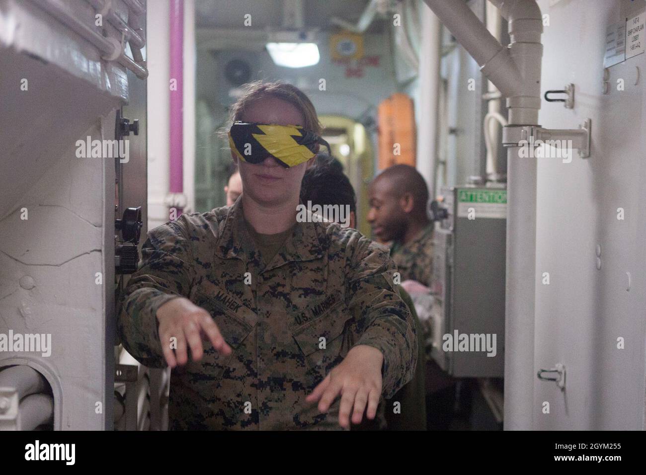 Eressing Cpl. Marissa Mahek, an aviation technician with Marine Medium Tiltrotor ...