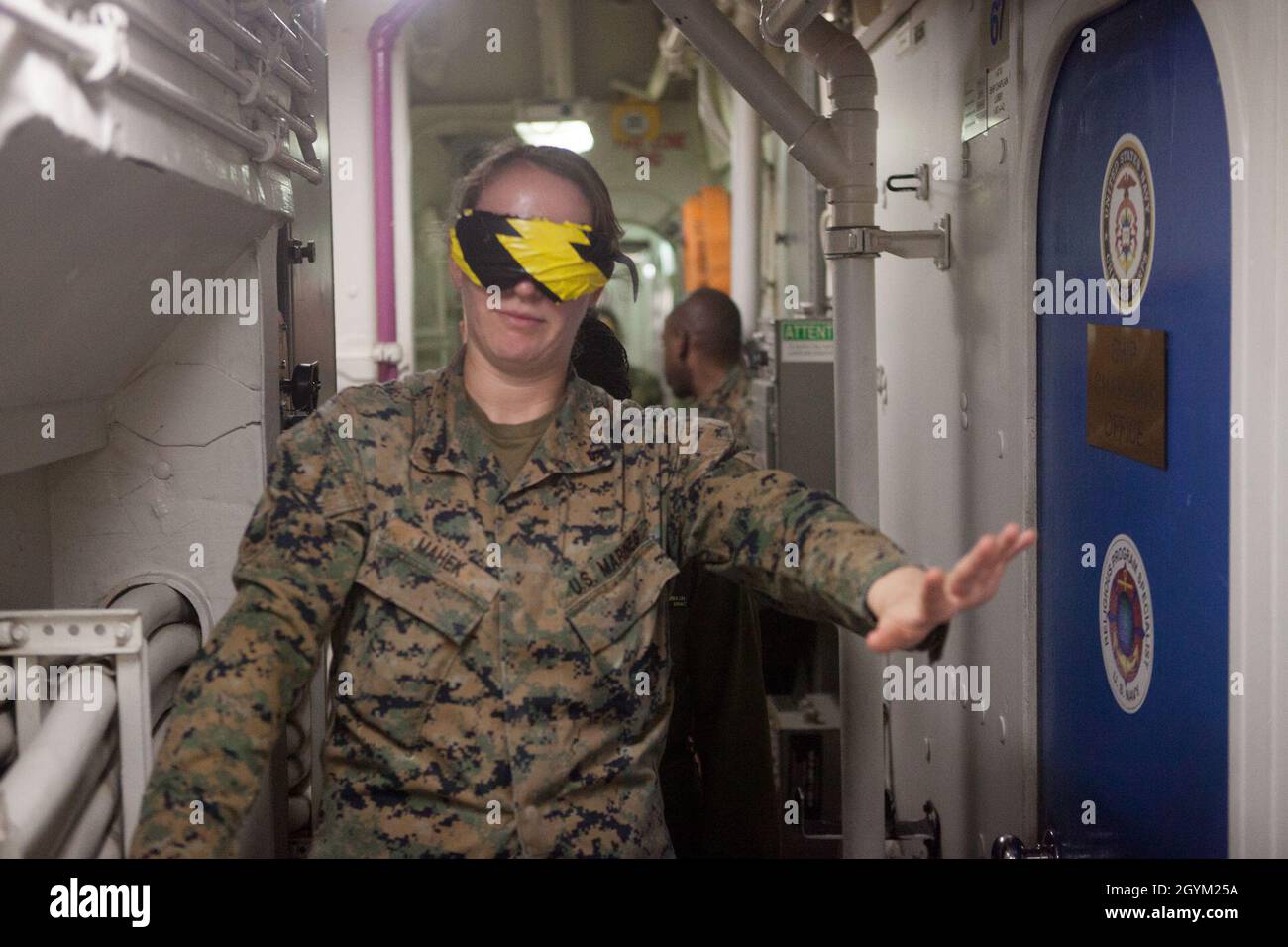 Eressing Cpl. Marissa Mahek, an aviation technician with Marine Medium Tiltrotor ...