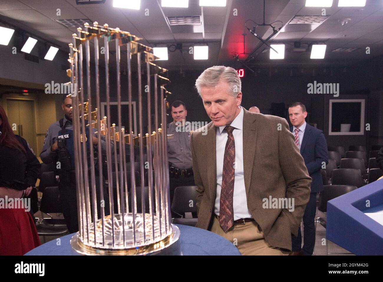 Principal Deputy Assistant to the Secretary of Defense for Public Affairs Charles E. Summers Jr. examines the Washington Nationals' 2019-2020 World Series Cup, at the Pentagon, Washington, D.C., Jan. 27, 2020. (DoD photo by Navy Petty Officer 2nd Class James K. Lee) Stock Photo