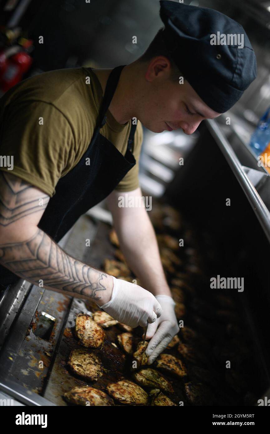 PACIFIC OCEAN (Jan. 27, 2020) Culinary Specialist Seaman Brannon Reed ...