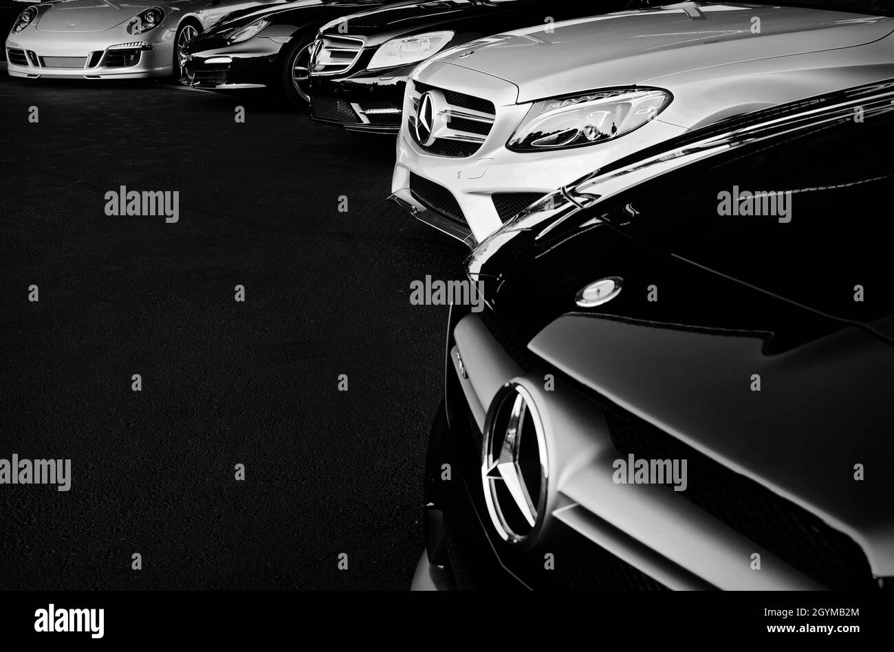 KANSAS CITY, UNITED STATES Oct 13, 2014 A greyscale shot of German Mercedes cars. Kansas, US