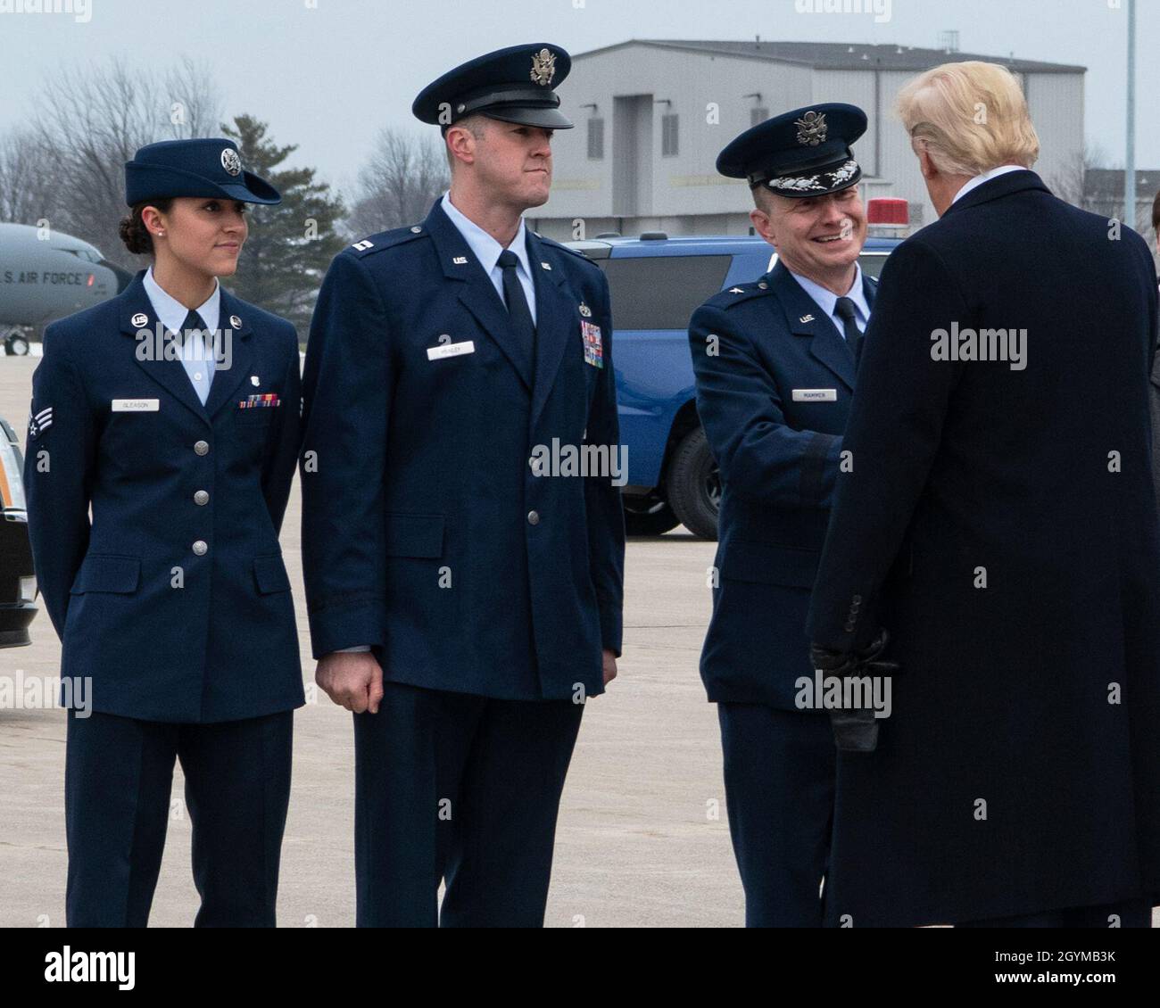 SELFRIDGE AIR NATIONAL GUARD BASE, Mich. -  (Left to right) 127th Wing Airman of the Year Airman 1st Class Jenna Gleason, Executive Officer Capt. Chris Manley, and Brig. Gen. Rolf E. Mammen, commander of the 127th Wing welcome President Donald Trump to Selfridge Air National Guard Base, Mich. Jan 30, 2020.  The President spoke briefly with the Selfridge Airmen before traveling to a nearby auto parts supplier in Warren, Mich.  Selfridge is home to many DoD units including the Air National Guard, Army, Navy, Marine Corps, Coast Guard, Customs and Border Protection and Border Patrol.  (U.S. Air N Stock Photo
