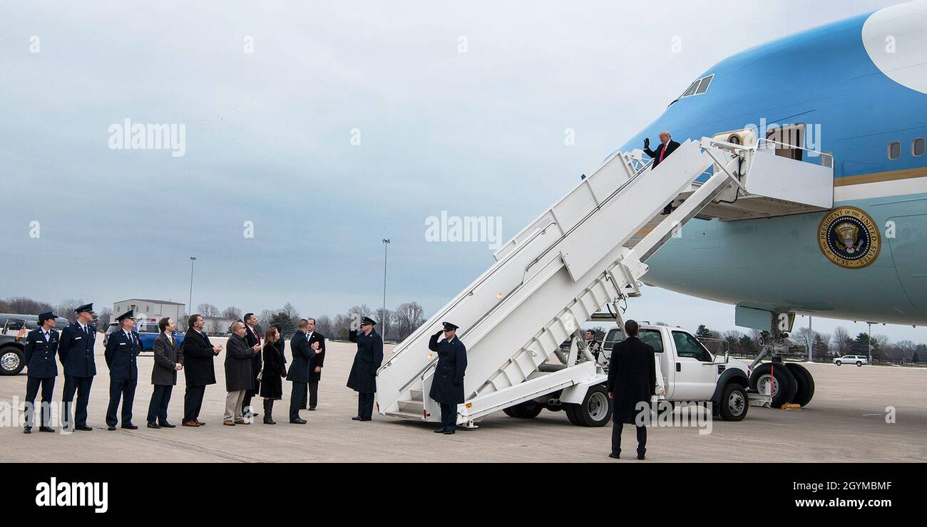 SELFRIDGE AIR NATIONAL GUARD BASE, Mich. - President Donald Trump steps down from Air Force One at Selfridge Air National Guard Base, Mich. and was greeted by local and base officials Jan. 30, 2020. The president spoke briefly with Brig. Gen. Rolf E. Mammen, commander of the 127th Wing and Airmen from the Wing before traveling to a nearby auto parts supplier in Warren, Mich.  Selfridge is home to the 127th Wing and many DoD units including the Air National Guard, Army, Navy, Marine Corps, Coast Guard, Customs and Border Protection and Border Patrol. (U.S. Air National Guard photo by Terry L. A Stock Photo
