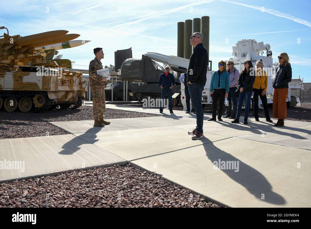 Tech. Sgt. Shaun Pechin, 547th Intelligence Squadron, speaks to civic