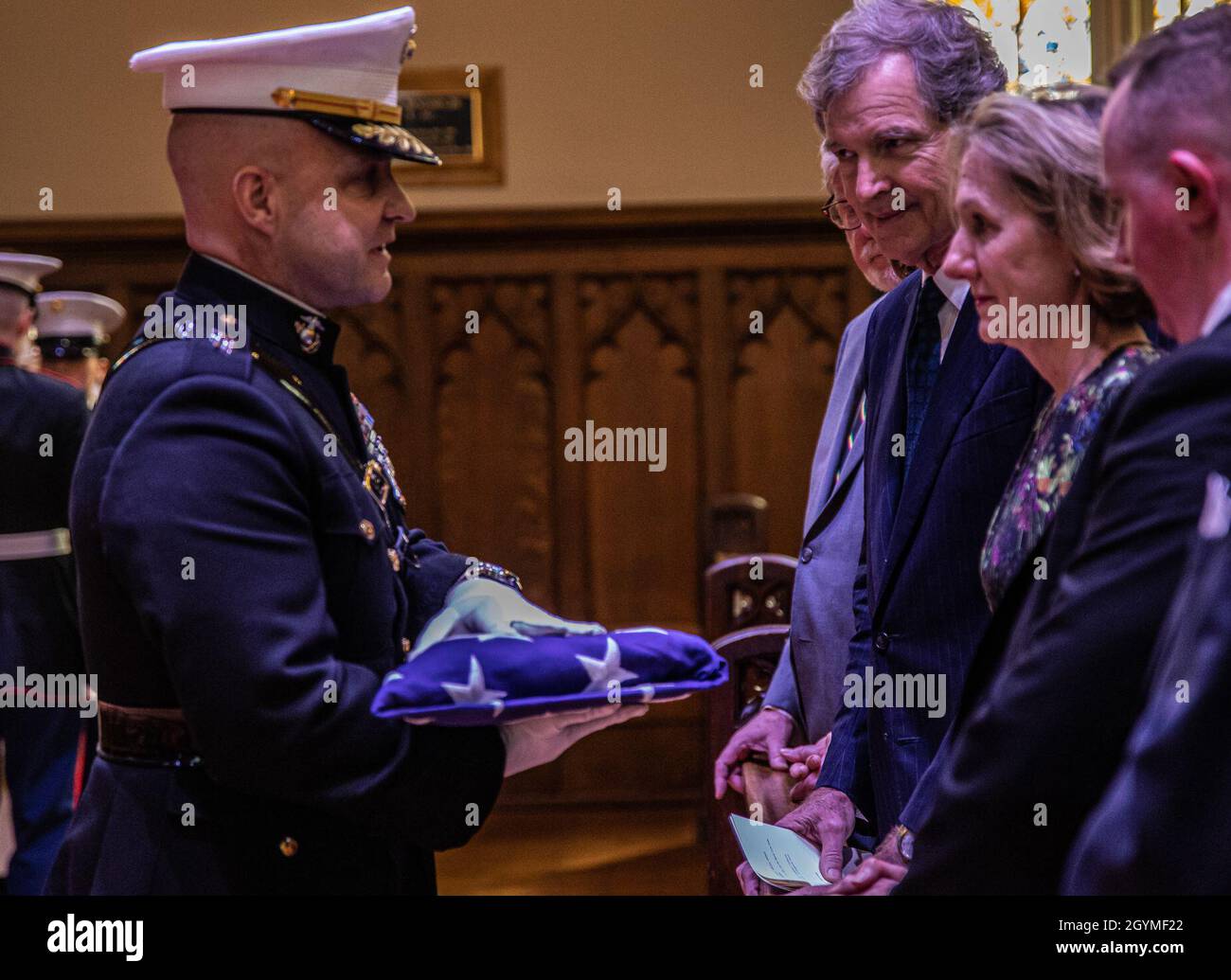 Lt. Gen. David G. Bellon, Commander, Marine Forces Reserves and Marine Forces North, presents the American Flag to the family of Brooke Helm Duncan at The Trinity Episcopal Church, New Orleans, Feb. 1, 2020. Mr. Duncan was a retired Corsair pilot for the United States Marine Corps and an Active civic leader in his community. (U.S. Marine Corps photo by Lance Cpl. Samwel Tabancay) Stock Photo