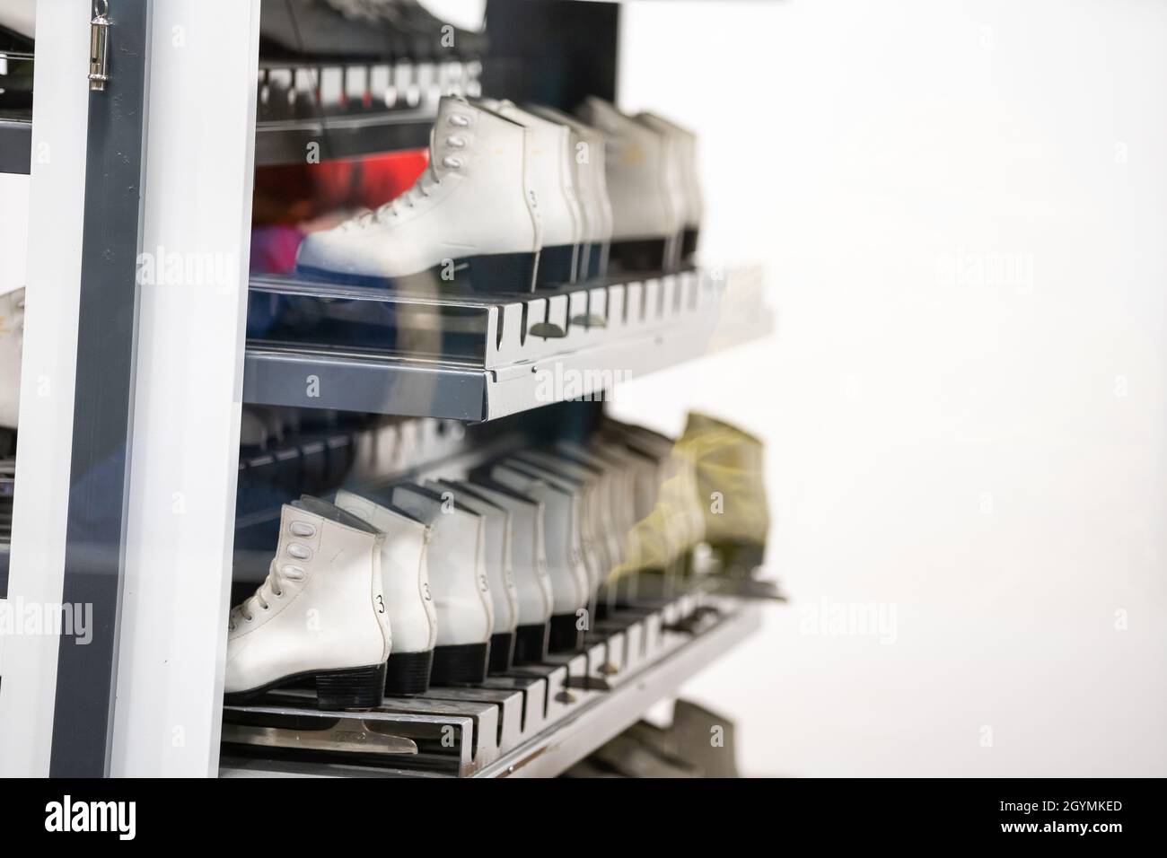 Closet with shelves full of ice skates for rent Stock Photo Alamy