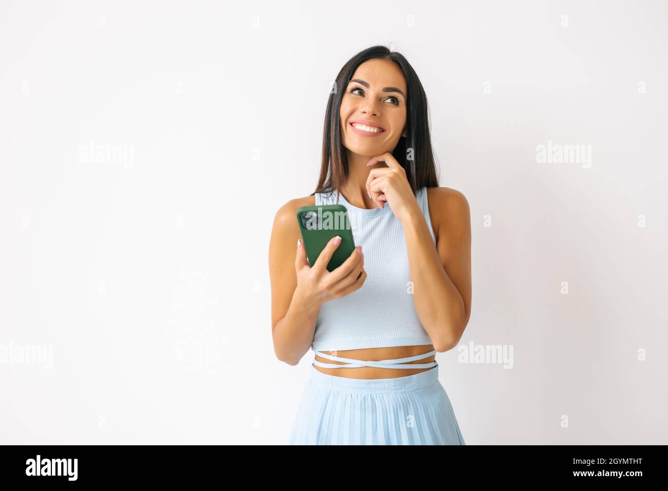 Young happy woman using smart phone. Excited surprised girl texting on ...