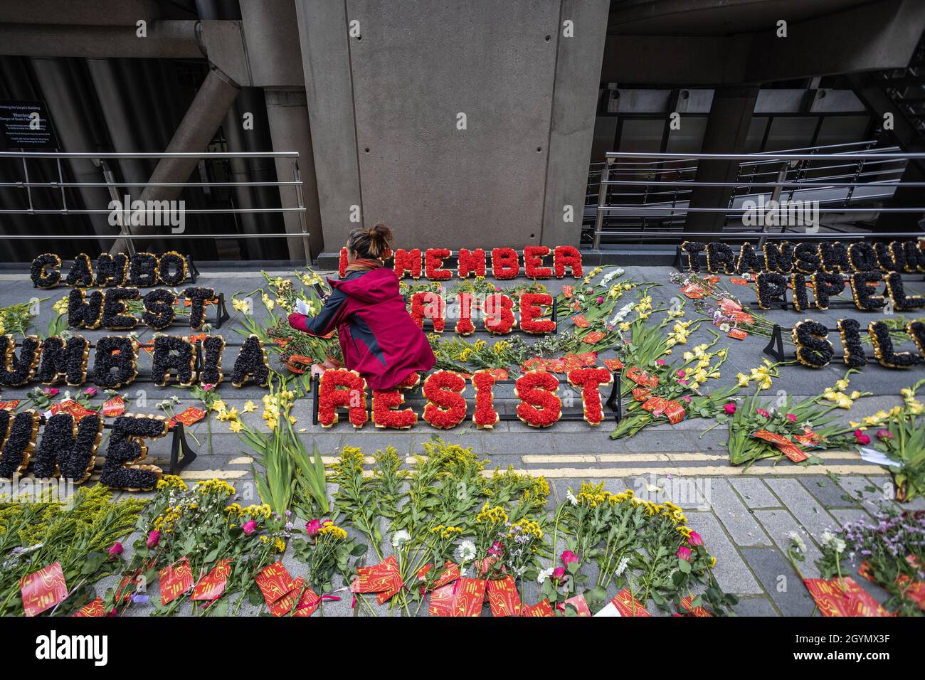 London, UK. 8th Oct 2021. Peaceful protest outside Lloyds of London. ©Enrique Guadiz Photography/Alamy Live News Stock Photo