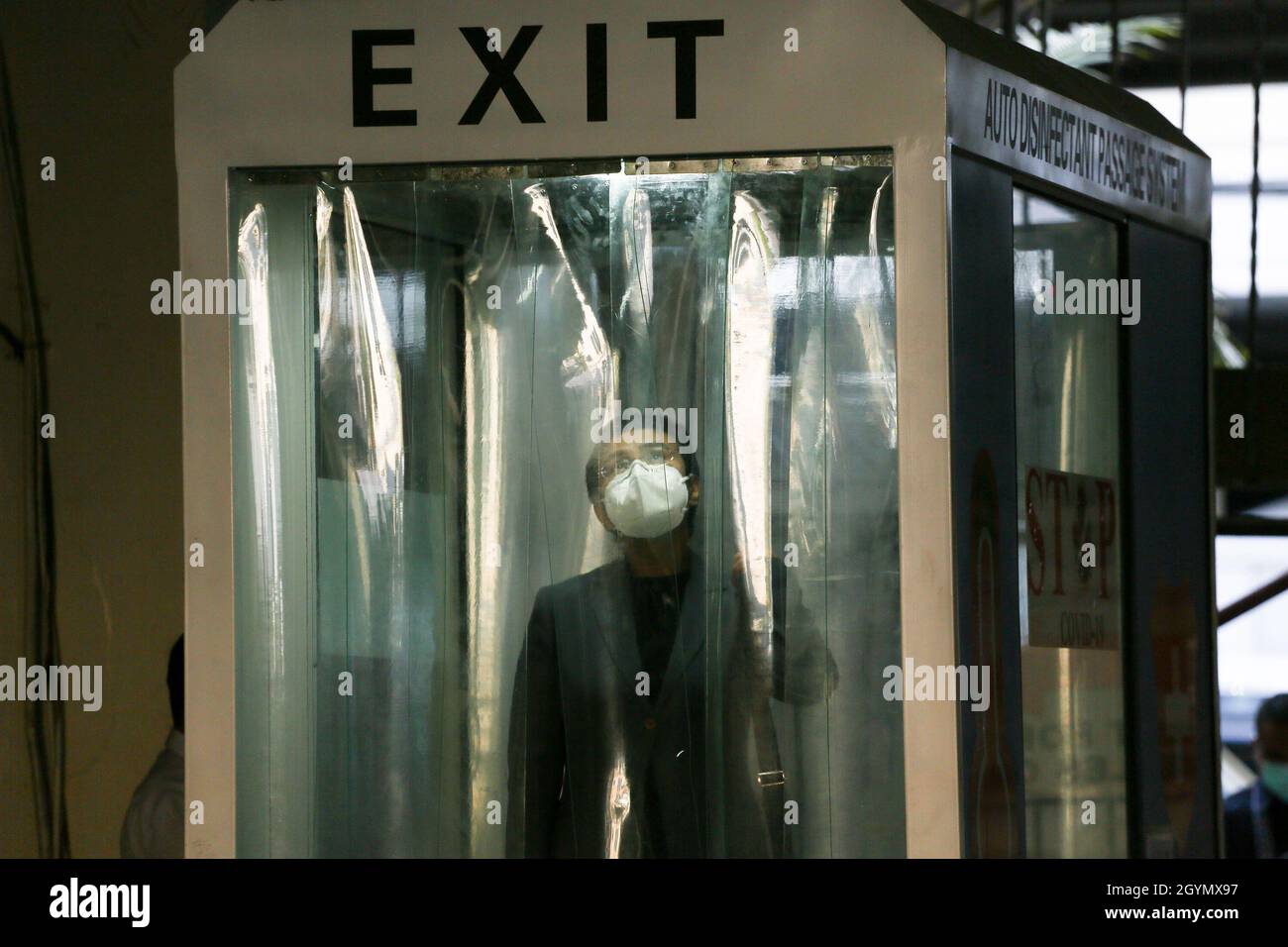 Rappler CEO and Executive Editor, Maria Ressa stands inside a disinfection booth as she arrives for a court hearing at the Manila Regional Trial Court, Philippines on Monday. June 15, 2020. The Manila court found Maria Ressa, her online news outfit Rappler Inc. and former reporter Reynaldo Santos Jr. guilty of cyber libel. Philippines. Stock Photo