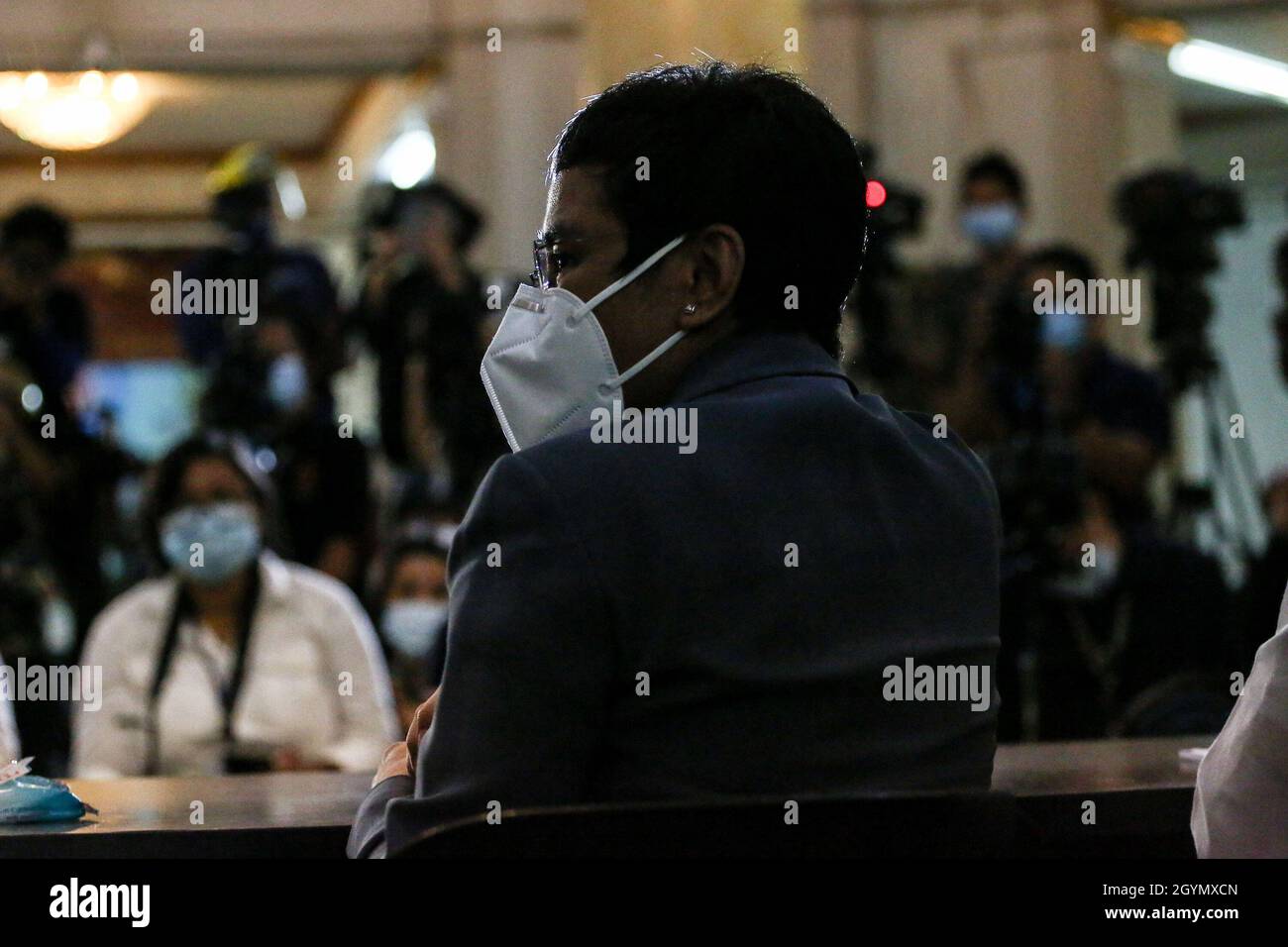 Rappler CEO and Executive Editor, Maria Ressa (center) wearing a protective mask attends a media conference after a court hearing at the Manila Regional Trial Court, Philippines on Monday. June 15, 2020. The Manila court found Maria Ressa, her online news outfit Rappler Inc. and former reporter Reynaldo Santos Jr. guilty of cyber libel. Philippines. Stock Photo