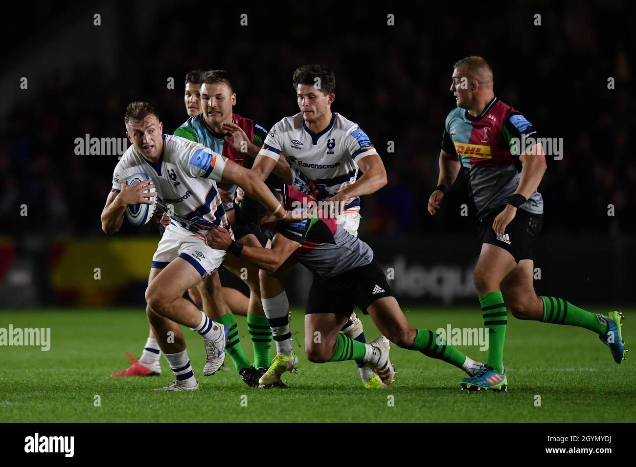 Twickenham Stoop Stadium, UK, UK. 8th October, 2021. Bristol Bears' Sam Bedlow is tackled by Harlequins' Tommy Allan during the Gallagher English Premiership game between Harlequins and Bristol Bears: Credit: Ashley Western/Alamy Live News Stock Photo