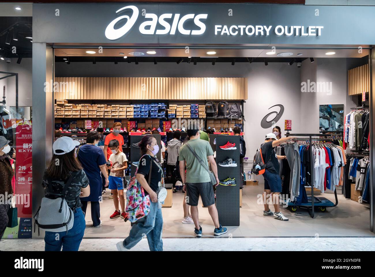 Hong Kong, China. 1st Oct, 2021. Shoppers are seen at the Japanese multinational sports equipment brand Asics outlet store Hong Kong. (Credit Image: © Budrul Chukrut/SOPA via ZUMA Press Wire