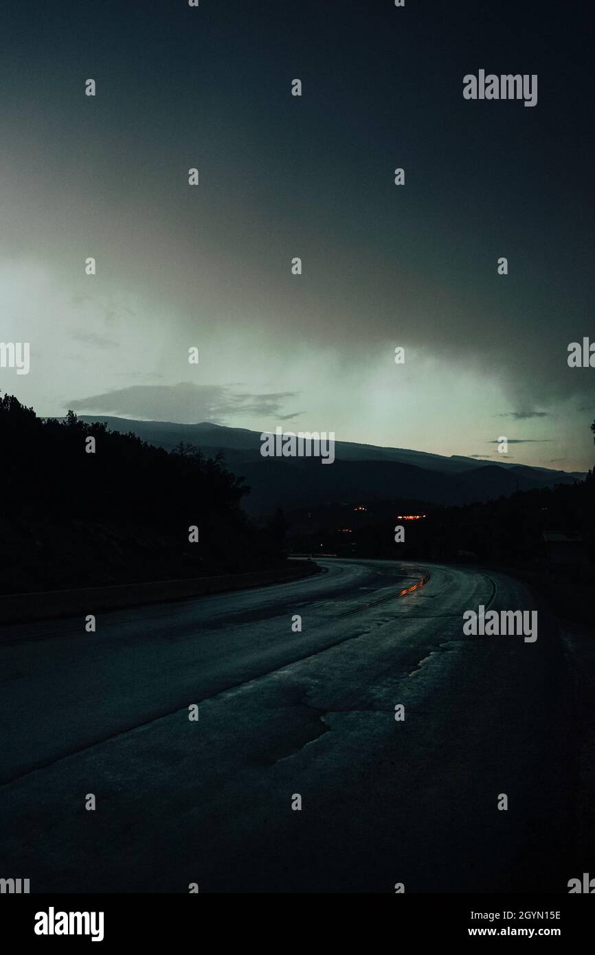 Vertical shot curved road hi-res stock photography and images - Alamy