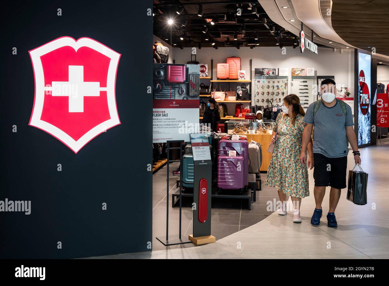 Hong Kong, China. 1st Oct, 2021. Shoppers walk past the Swiss knife  manufacturer and luxury watchmaker brand Victorinox store in Hong Kong.  (Credit Image: © Budrul Chukrut/SOPA Images via ZUMA Press Wire