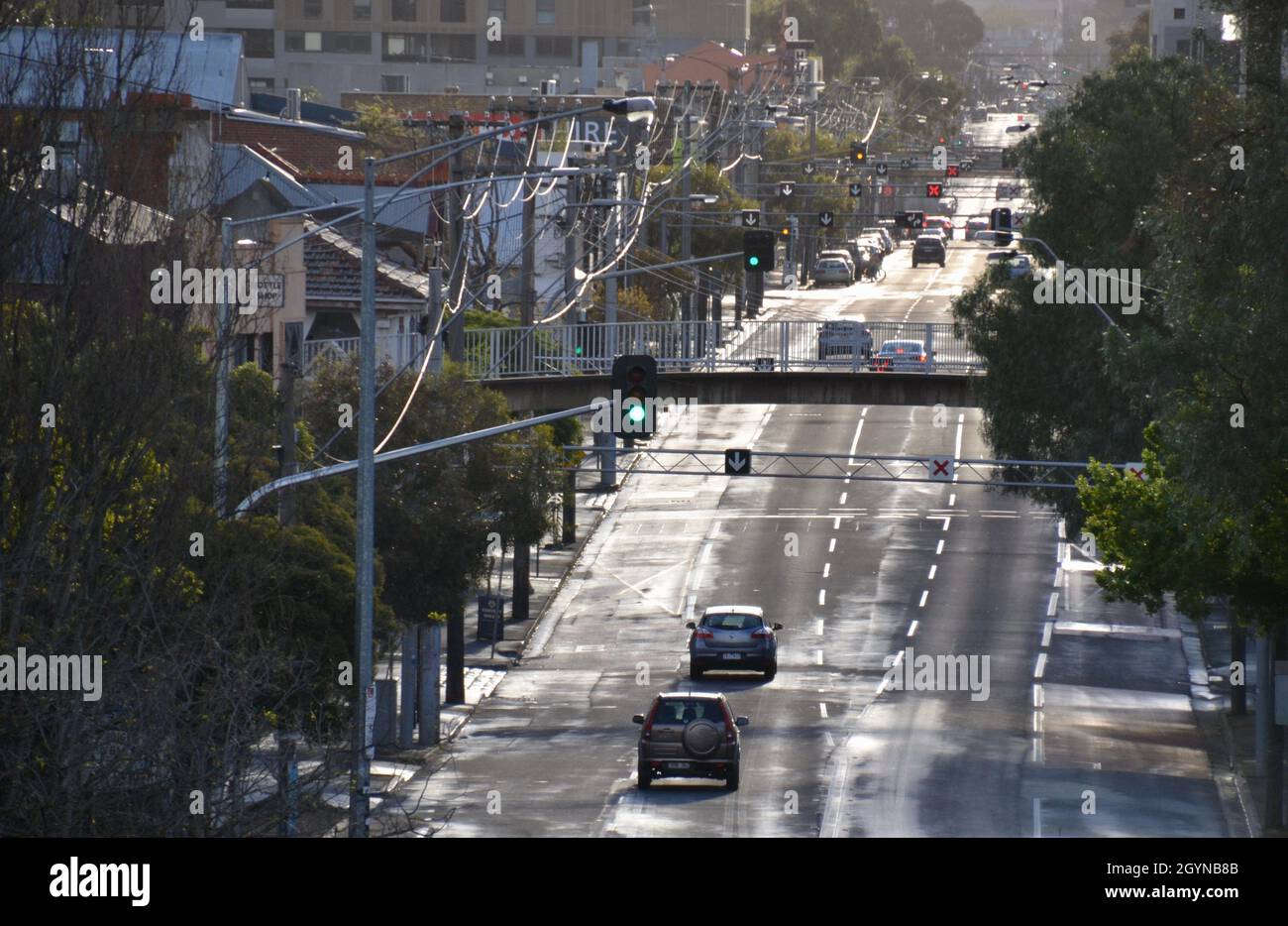 Empty and quiet Johnston Street in inner Melbourne suburb of Collingwood during COVID-19 pandemic lockdown Stock Photo