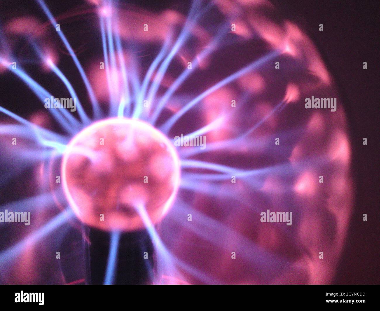 Closeup with a plasma lamp on a black background Stock Photo - Alamy