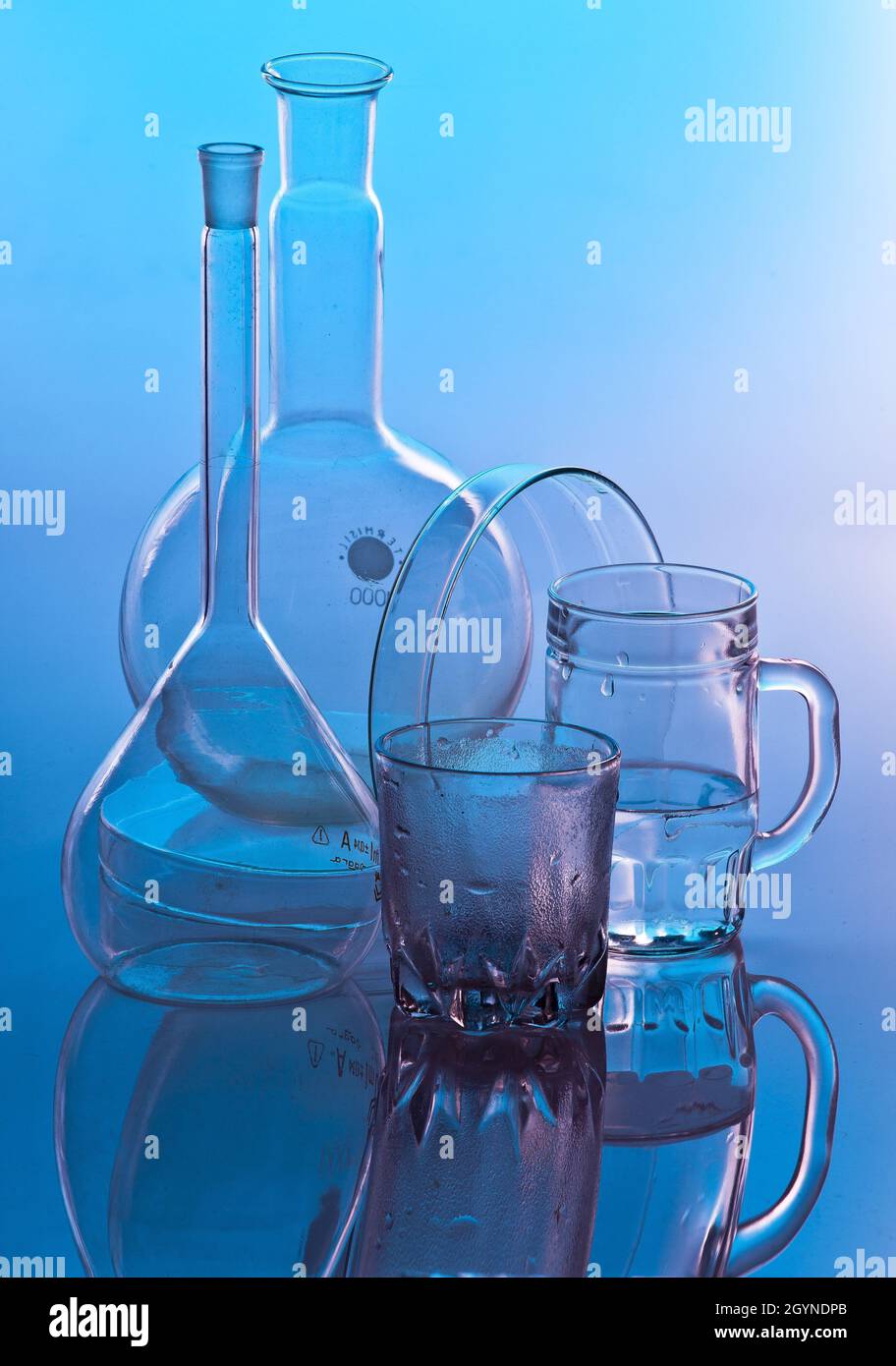 Vertical shot of glass containers for chemistry lab Stock Photo - Alamy