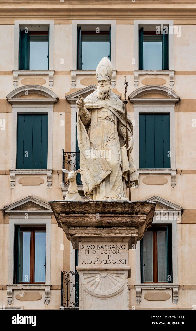 Statue of Saint Bassianus of Lodi, sculpted in the 17th century by Orazio Marinali, in piazza Libertà, Bassano del Grappa, Veneto region, Italy Stock Photo