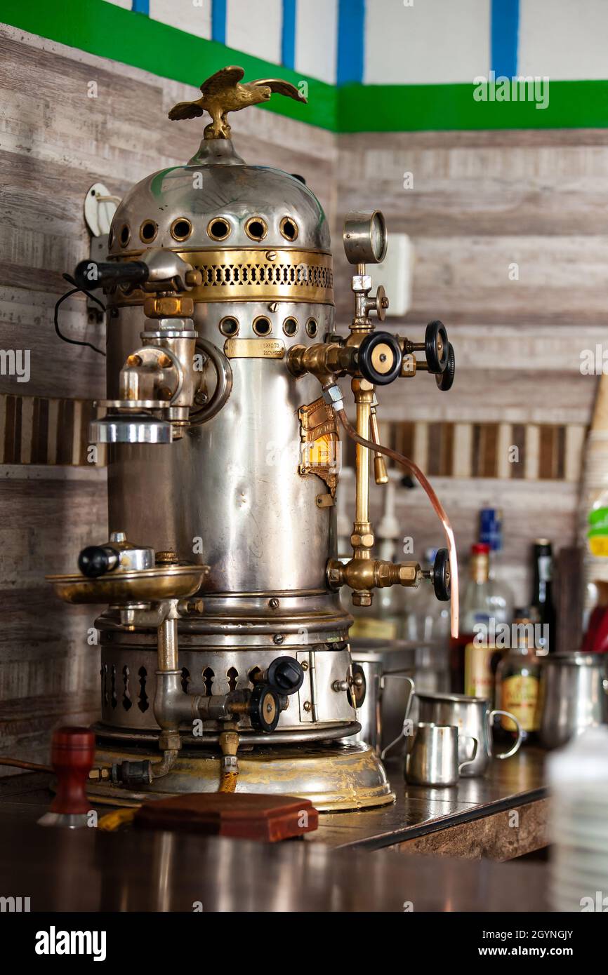 https://c8.alamy.com/comp/2GYNGJY/salento-colombia-july-2021-the-victoria-arduino-oldest-coffee-maker-on-town-built-in-1905-at-the-famous-cafe-de-la-esquina-in-the-small-city-of-2GYNGJY.jpg