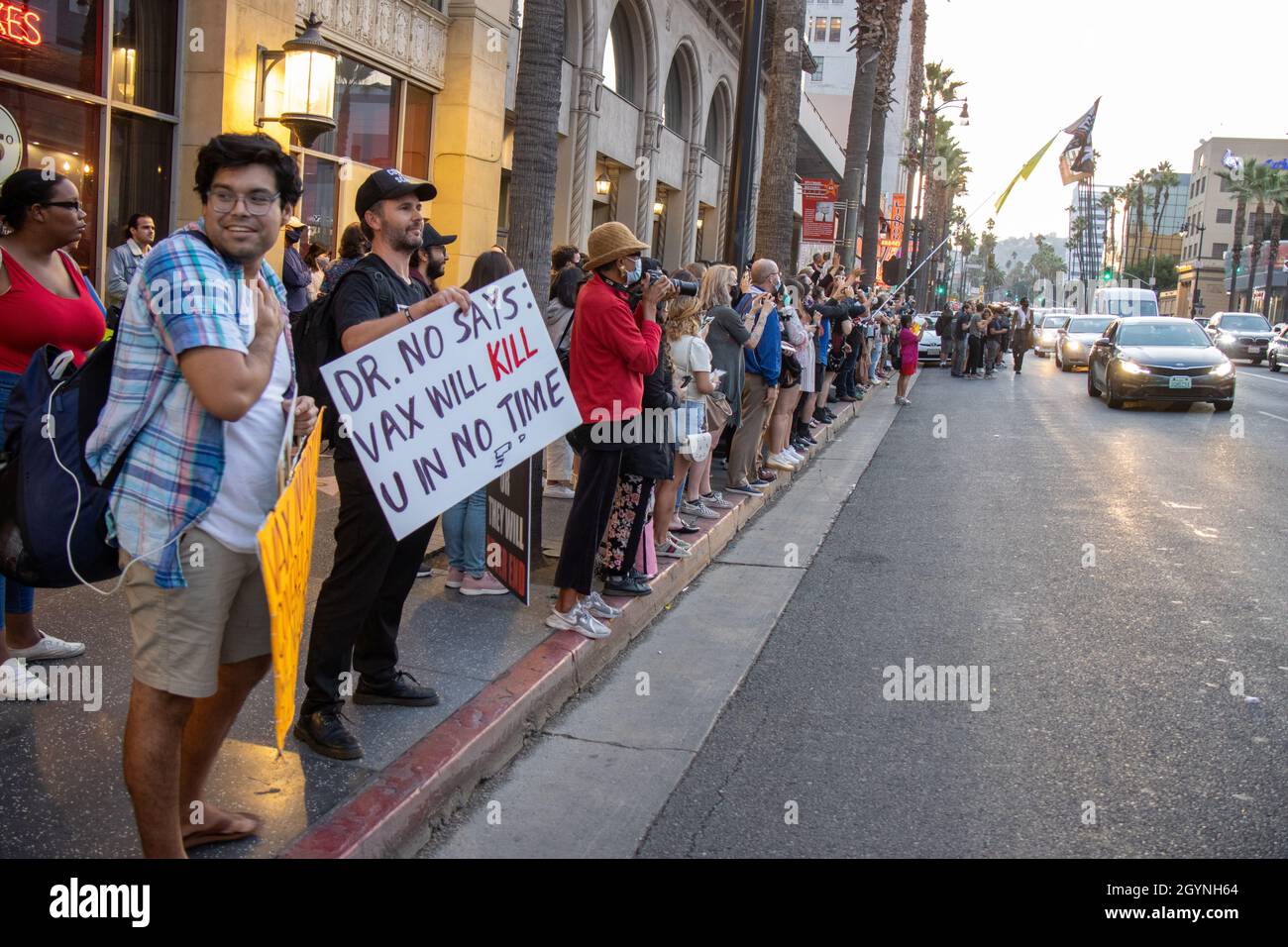 Anti covid-19 vaccine protestors across the street from the unveiling of Daniel Craig's star on the Hollywood Walk of Fame Stock Photo