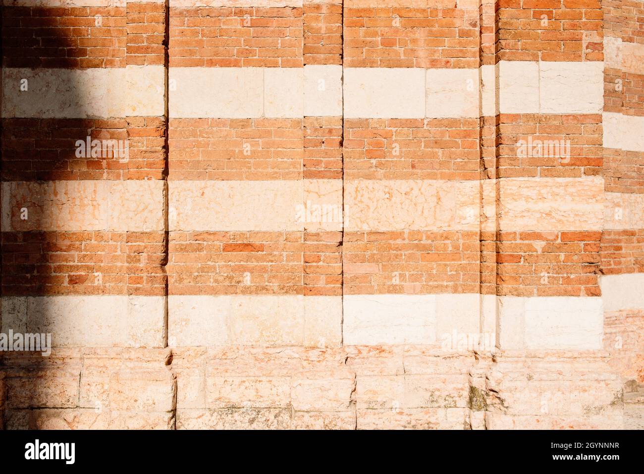 Background and texture of the traditional Italian two-color brick wall