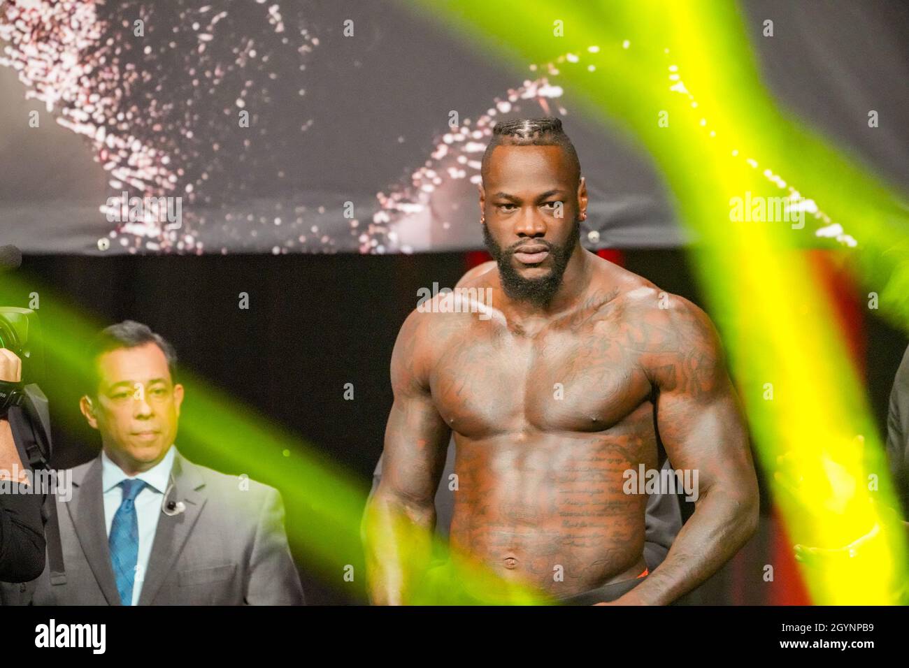 Las Vegas, USA. 08th Oct, 2021. LAS VEGAS, NV - OCTOBER 8: Deontay Wilder and his team bicker back and forth with Tyson Fury and his team during   the official weigh-ins at MGM Grand Garden Arena for Tyson Fury vs Deontay Wilder III - Weigh-ins on October 8, 2021 in Las Vegas, NV, United States. (Photo by Louis Grasse/PxImages) Credit: Px Images/Alamy Live News Stock Photo